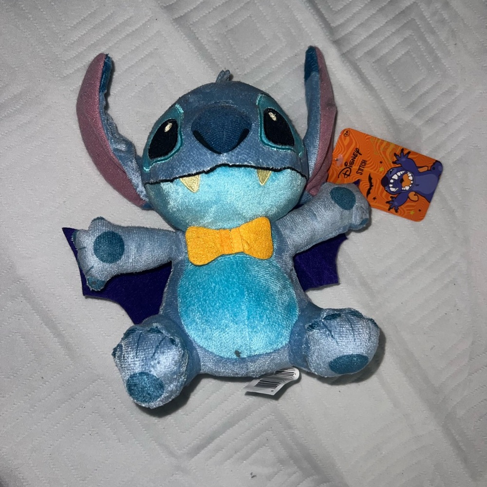 Blue Plush Toy with Yellow Bow Tie